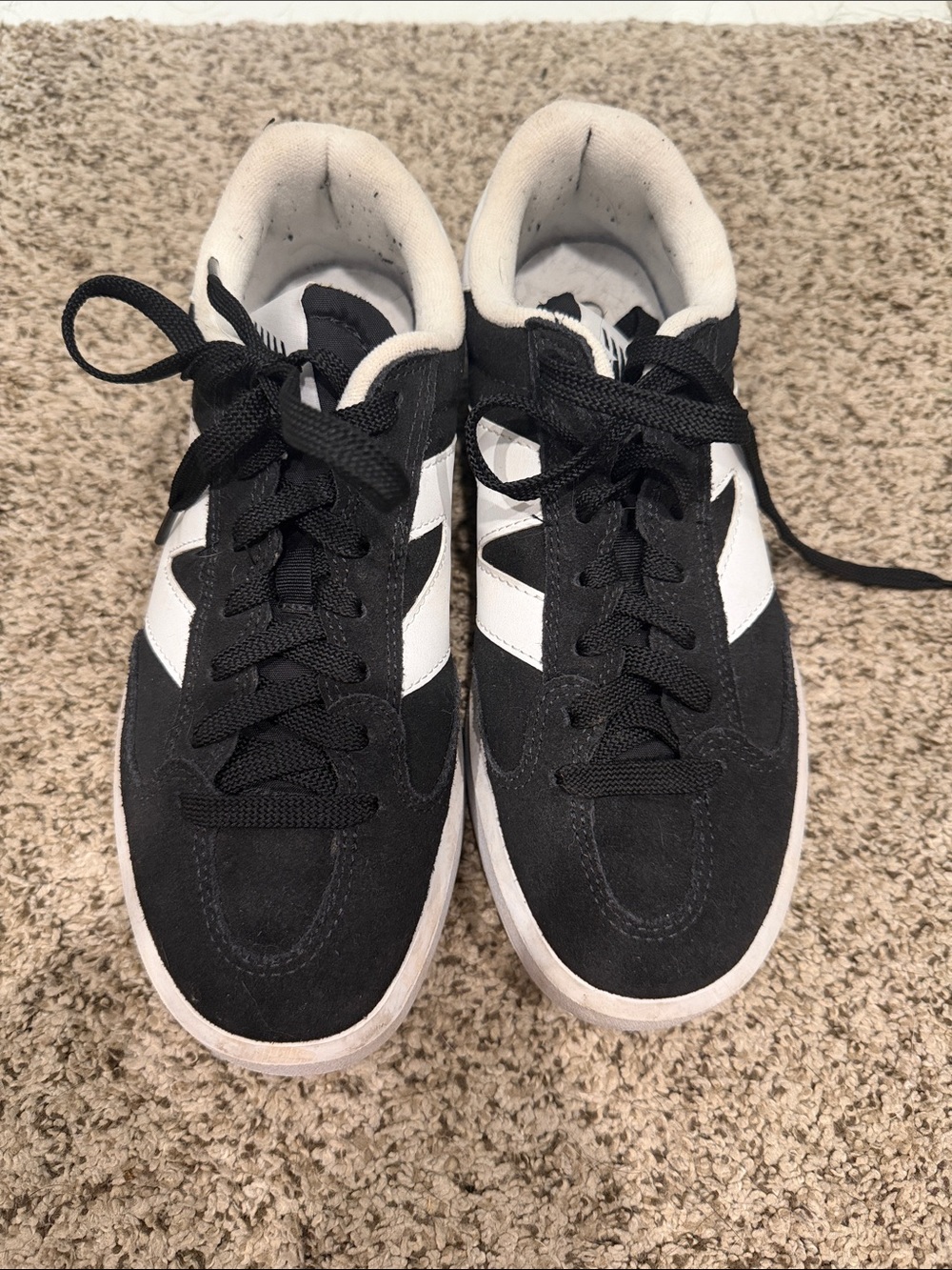 New Balance Black and White Suede Low-Top Sneakers